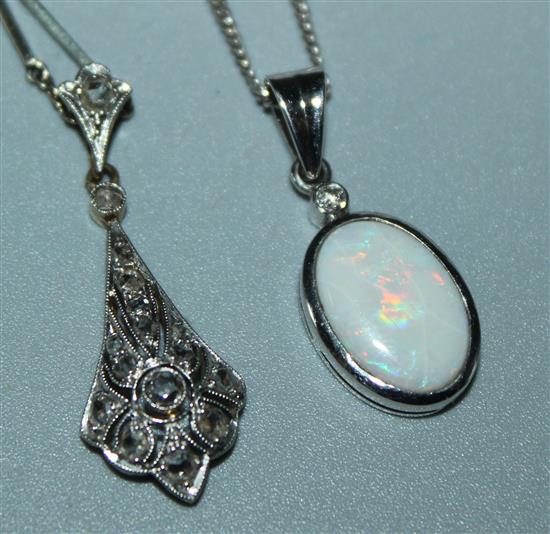 Diamond pendant on chain and oval pendant on chain